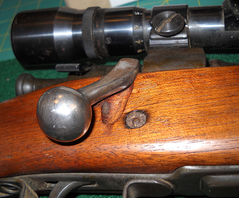 closeup of bolt handle with stock cutaway